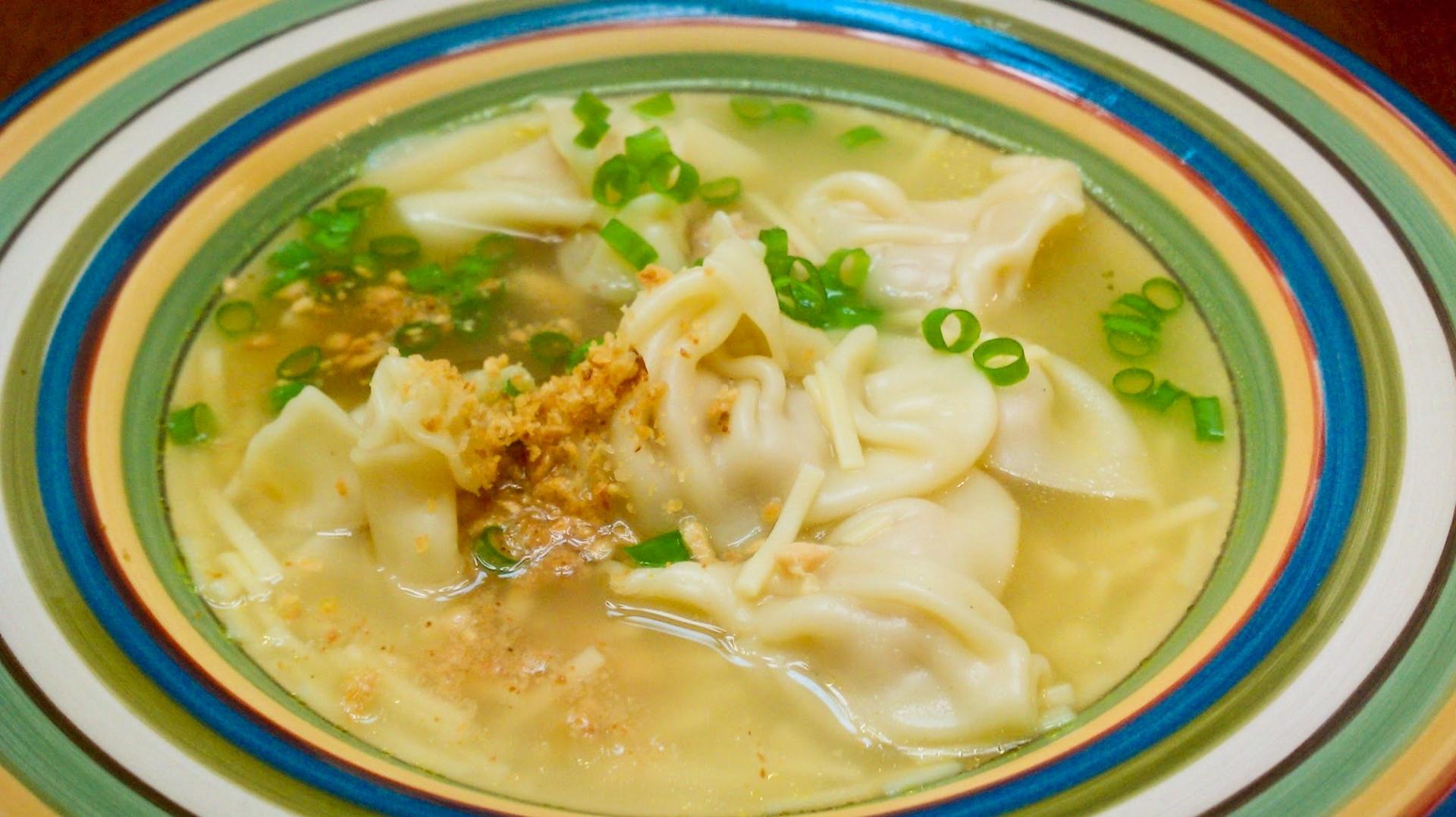 Pancit Molo, Iloilo’s signature dumpling soup, features pork in savory broth.