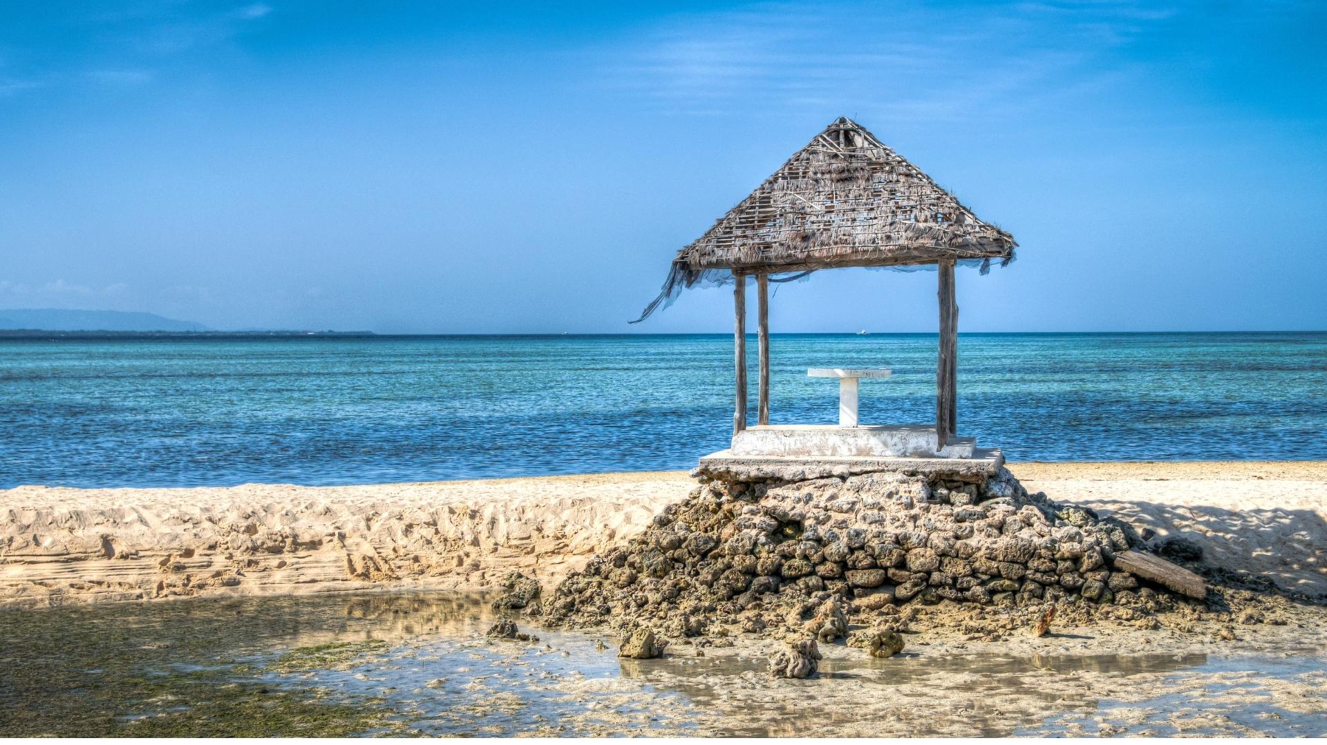 Pandanon Sandbar offers crystal-clear waters and a postcard-perfect beach experience.