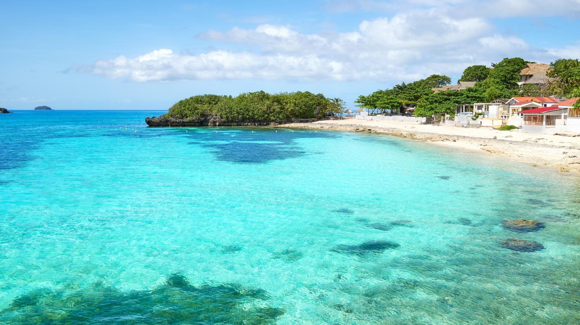 Malapascua offers white-sand shores, crystal waters, and unique shark encounters.