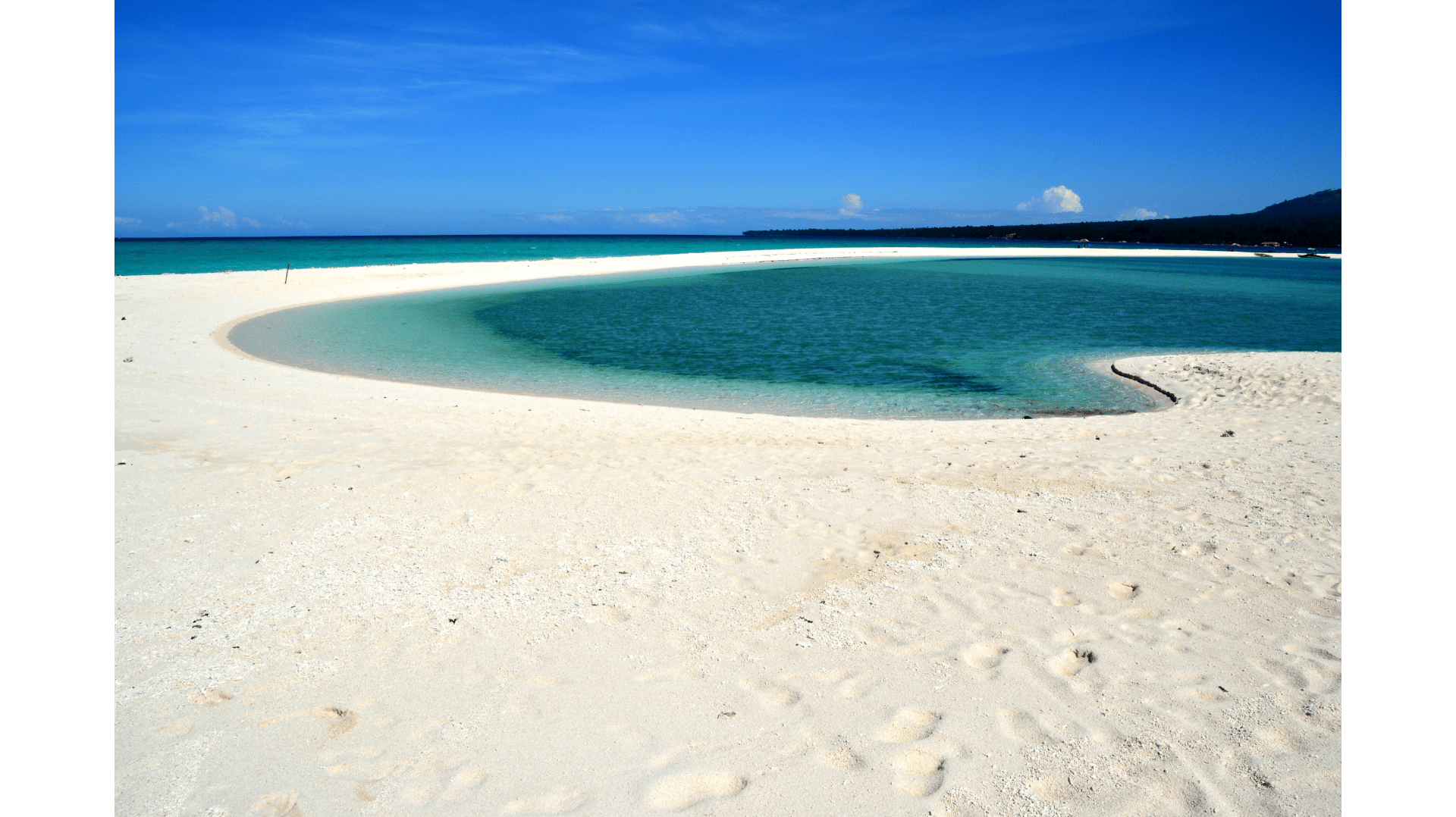 Mambajao, Camiguin’s capital, offers beaches, markets, and island life.